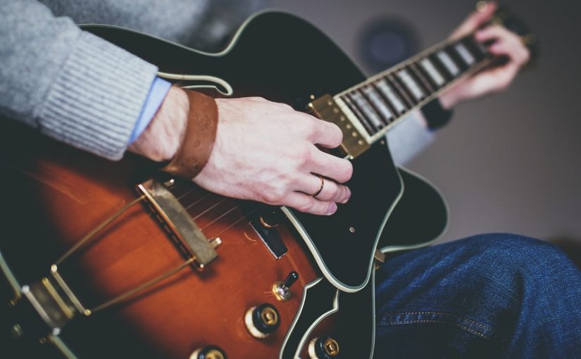 Why learning to play the guitar can make you happier
