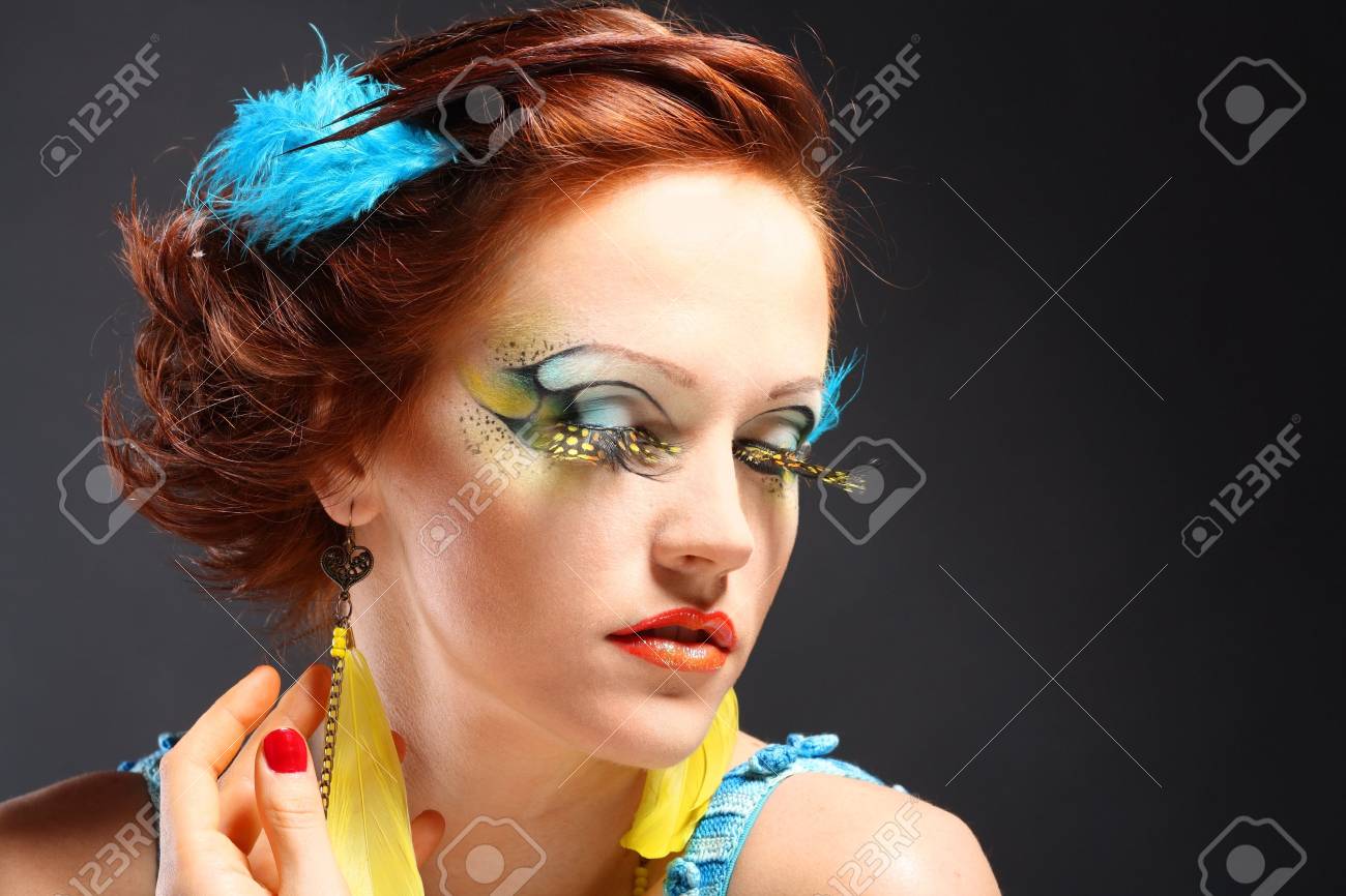 13401440-gorgeous-young-model-beautiful-women-with-perfect-art-make-up-and-long-false-eyelashes-made-from-fea