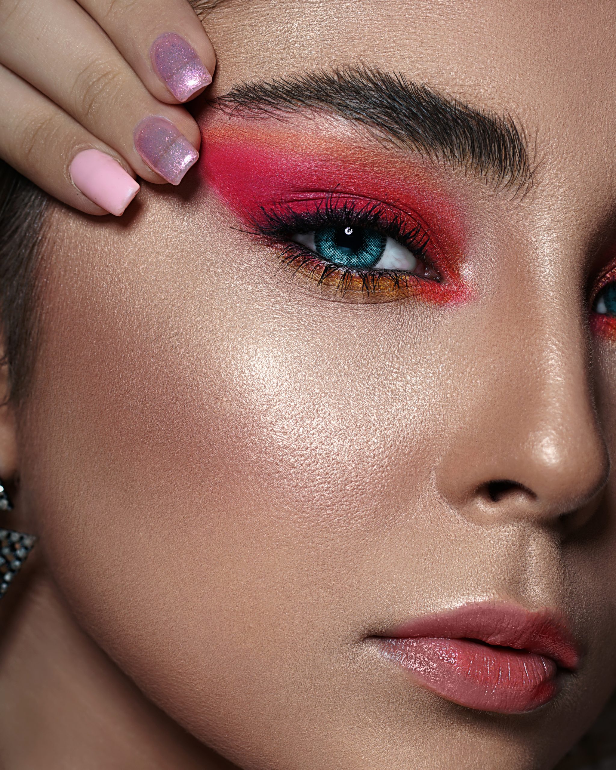 close-up-photo-of-woman-with-pink-eyeshadow-3912572